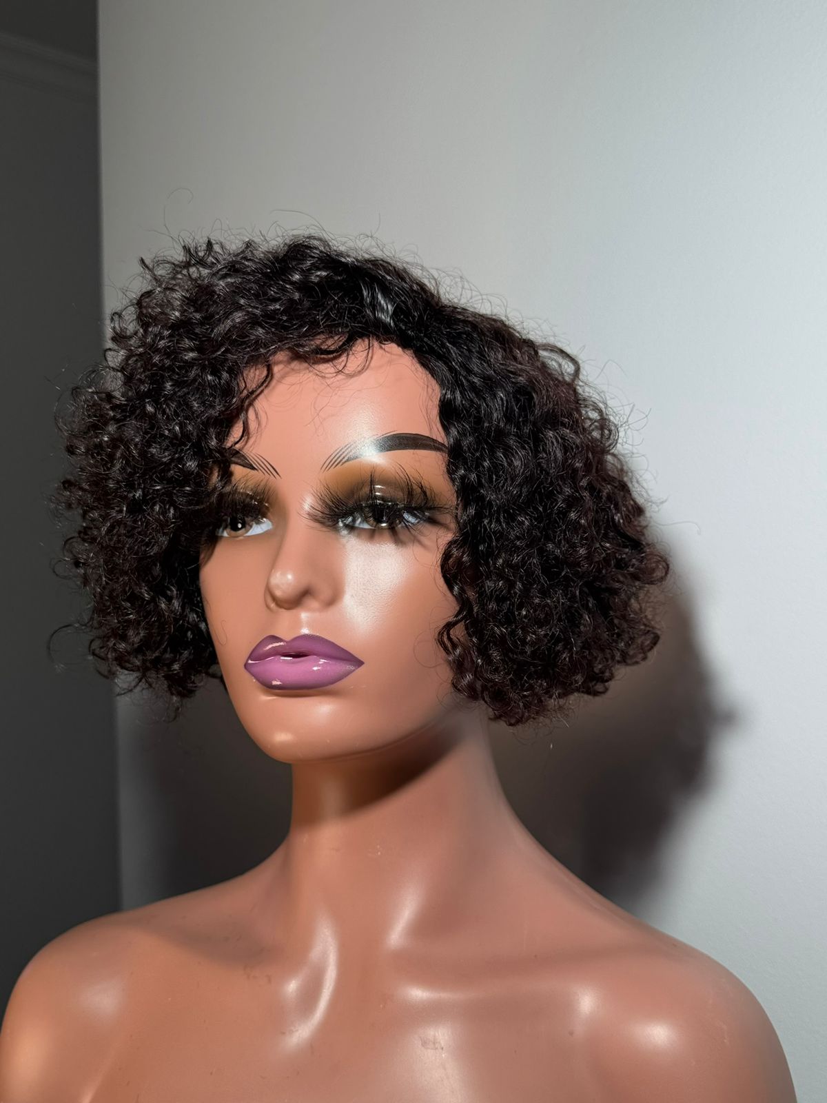 Whitney 02301 Mongolian Curl Fringe Unit in Natural Black 1B/2 featuring premium 100% human hair and short textured curls